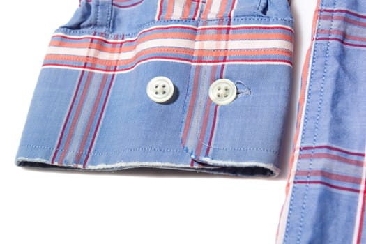 Frayed sleeve cuff on long sleeve men's shirt on white background