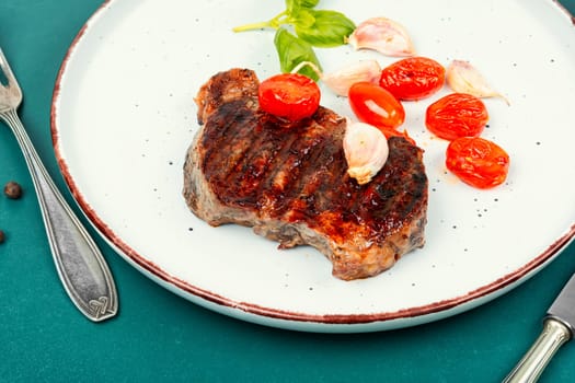 Juicy meat, classic grilled steak, beef steak. Meat barbecue, rump steak.