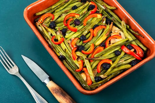 Vegetable pie with green or bush beans and peppers. Delicious snack. Top view.
