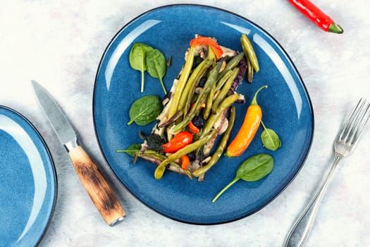 Vegetable pie with green or bush beans and peppers. Delicious snack. Top view.