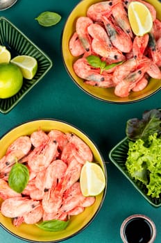 Uncooked raw prawns or shrimps with spices and herbs. Close up