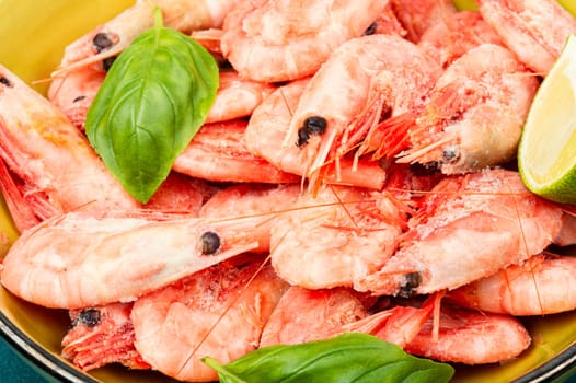 Uncooked raw prawns or shrimps with spices and herbs. Close up