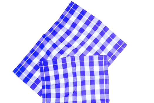 Closeup of a blue and white checkered napkin or tablecloth texture isolated on white background. Kitchen accessories. Top view.