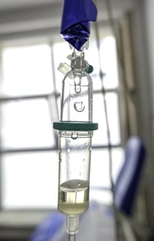 Detail of intravenous medication in a hospital, illness