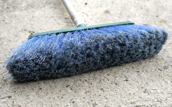 Detail of old dirty and damaged sweeping broom