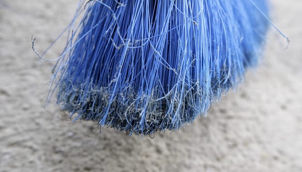 Detail of old dirty and damaged sweeping broom