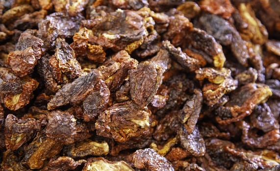 Detail of dried vegetables in a market, spicy seasoning