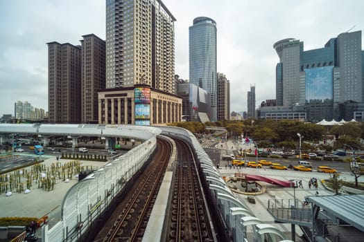 Taiwan 28 December 2022: Train cross the city in Taipei city
