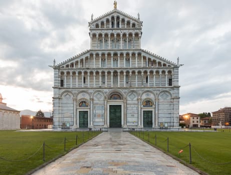 Pisa, Italy - 29 June 2023: cathedral sightseeing, travel destination, sunrise light, famous artistic building