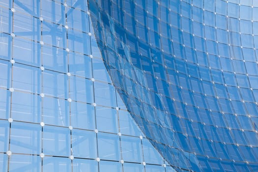 Poitiers, France - September 22 2010:Blue glass on a building in Futuroscope French amusement park