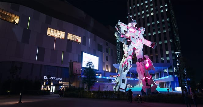 Tokyo, Japan 30 June 2019: Unicorn Gundam robot statue in odaiba at night