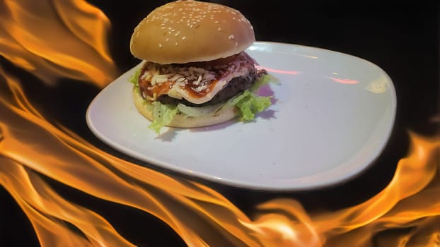 Masterpiece from the grill: Juicy hamburger with fresh ingredients
