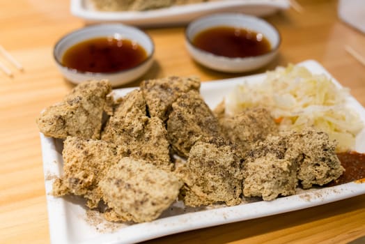 Deep fry stinky tofu on the dish