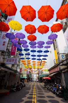 Taiwan 02 February 2024: Colorful Umbrellas Hanging In Hou Yi Shopping Street in Kaohsiung of Taiwan