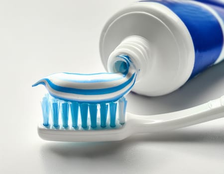 Use a toothbrush to clean partial dentures from replacement teeth.