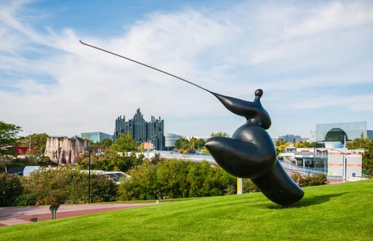 Poitiers, France - September 18, 2010: General view of the pavilions of the Futuroscope theme park in Poitiers. Sculpture by Jean-Louis Toutain
