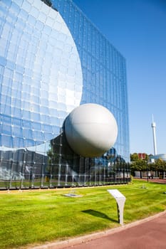 Poitiers, France - September 22 2010: Imax 3D. Glass building in Futuroscope, a French theme park that lets you experience sounds, images, and sensations