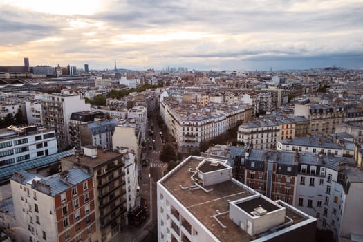 Paris cityscape with Eiffel Tower and famous buildings at sunset, Ile-de-France, France