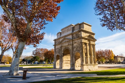 Famous Roman triumphal arch in Orange city, in the Vaucluse department in the Provence-Alpes-Côte d'Azur region. Photography taken in France