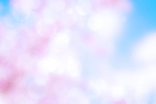 Abstract blurred fresh vivid spring summer light delicate pastel blue pink white bokeh background texture with bright circular soft color lights. Beautiful backdrop illustration.