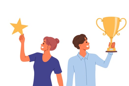 Successful business man and woman have become winners of competition among company managers and holding trophies. Winners hold gold cup and star in hands, symbolizing achievements on career ladder