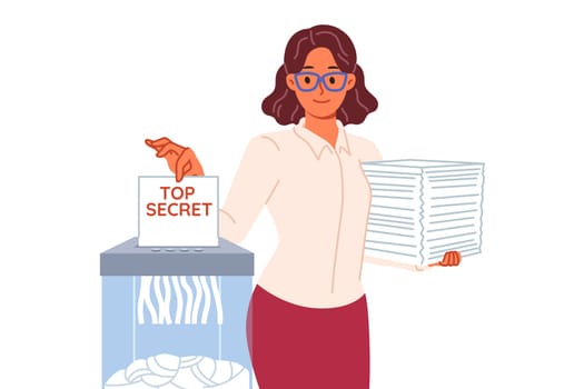 Woman shreds classified documents using shredder to destroy confidential and sensitive information. Lady politician uses shredder to hide data proving crime or ineffective work of parliament