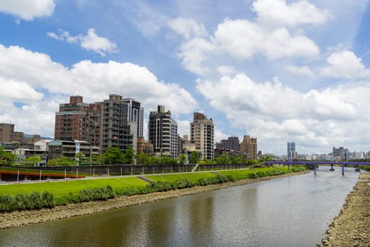 Taipei, Taiwan 25 July 2023: Taipei city skyline in riverside
