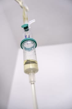 Detail of intravenous medication in a hospital, illness