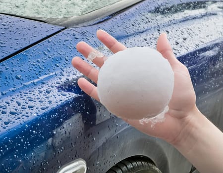 Hail damage to the car. Damaged hood and windshield