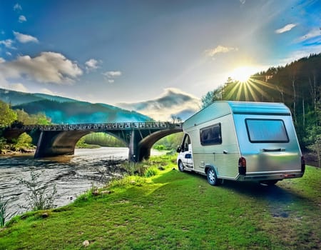 Camping on the beautiful river in summer with an old bridge in the background