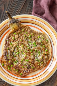 Tortang Talong filipino eggplant omelette on the plate