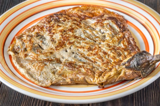 Tortang Talong filipino eggplant omelette on the plate