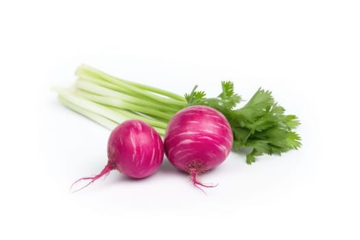 Two fresh beets with their leafy greens intact, isolated on a white background, highlighting their natural appeal.