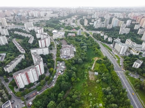 Top view of the city of Moscow, buildings and roads and other infrastructure of the city. Cityscape view from above.