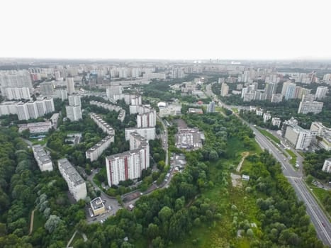 Top view of the city of Moscow, buildings and roads and other infrastructure of the city. Cityscape view from above.