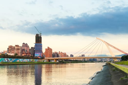 Taiwan 14 December 2023: Taipei city park at riverside under sunset