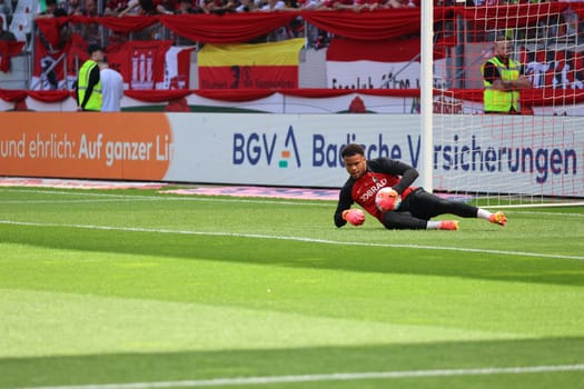 Goalkeeper Noah Atubolu (SC Freiburg) at the match of the 1st FBL: 23-24: 33rd Sptg. SC Freiburg - 1st FC Heidenheim  DFL REGULATIONS PROHIBIT ANY USE OF PHOTOGRAPHS AS IMAGE SEQUENCES AND/OR QUASI-VIDEONann  Photo: Joachim Hahne/johapress