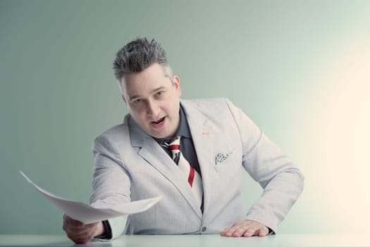 Energetic anchorman in stylish suit gestures dynamically with paper, making an enthusiastic point about the news