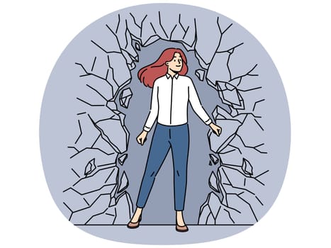 Successful businesswoman break stone wall