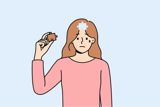 Depressed woman cries, feeling lack of motivation for development, and pulls piece of puzzle out of head. Girl with mental health disorder crying, needing support from friends and boyfriend