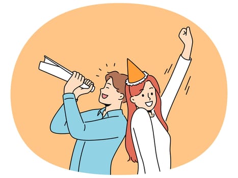 Happy people celebrate birthday or special occasion. Smiling couple in cone on head have fun celebrate Friday dayoff. Party and celebration.