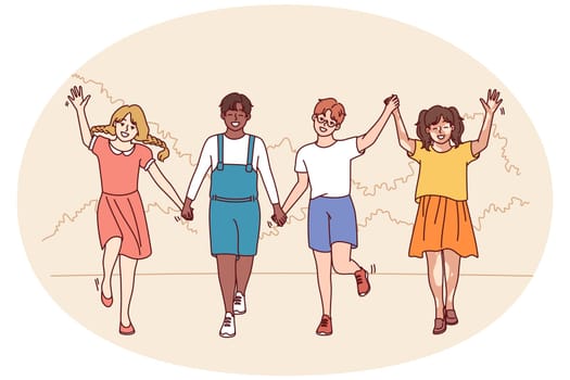Friends teenagers diversity nationalities and races walk in park holding hands enjoying friendship and spending summer holidays together. Multiethnic boys and girls for concept diversity in society