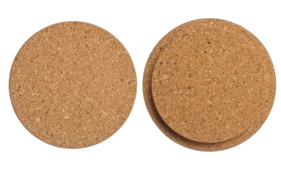 Brown bottle cap made from cork tree bark on isolated background, top view. Set