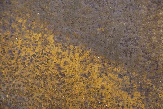 Detail of old metal wall damaged by time, ruin