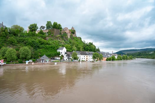 Flood of the river Saar, Saarburg in Saarland, Germany, flooded trees and paths, high water level, climate change