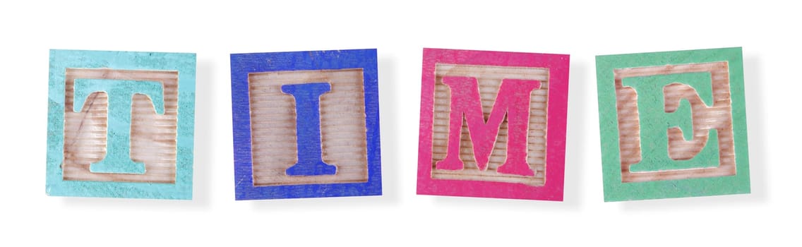 A time concept with childs wood blocks on white with clipping path to remove shadow