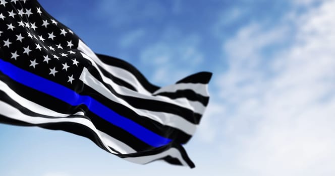 The american flag in the Thin Blue Line variant waving in the wind symbolizing support for law enforcement. 3d illustration render. Selective focus. Rippling fabric