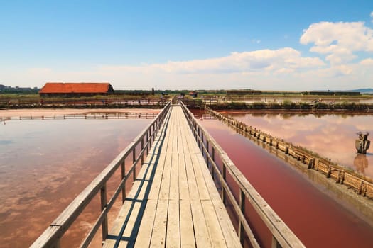 Board walk into the Burgas Salt Pans, a group of salty pink pools at Atanasovsko, Atanasovo Lake, Burgas, Bourgas, Bulgaria 2022