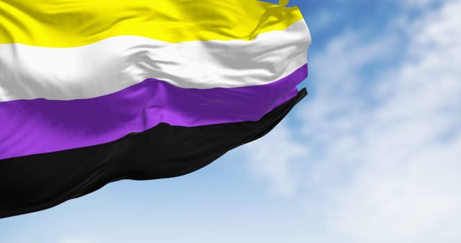 Non-binary flag waving on a clear day. Pride flag that represents the non-binary community. 3d illustration render. Selective focus.