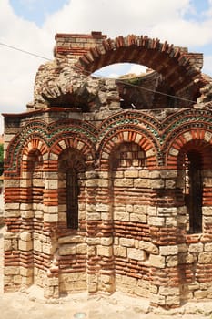 The Church of the Holy Archangels Michael and Gabriel in the old town of Nessebar, Nesebar, elaborate facade decorated with colorful patterns out of bricks and tiles, Bulgaria 2022